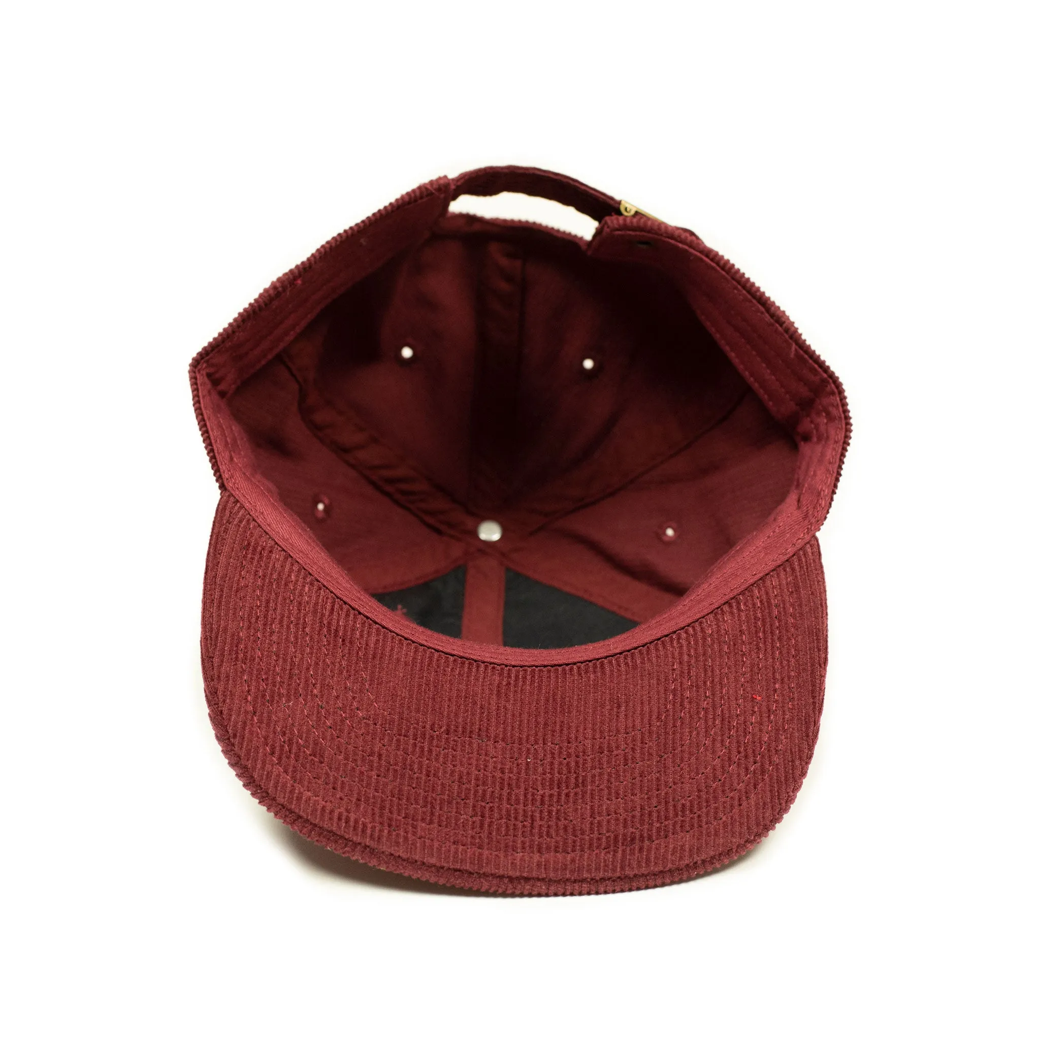 Corduroy cap in crimson with racing flag chainstitched embroidery